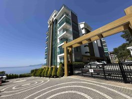 Квартира 1+1 с панорамным видом на море в премиальном ЖК на первой береговой. Каргыджак