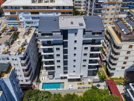 Новая квартира 1+1 всего в 300 м от моря и пляжа. Махмутлар