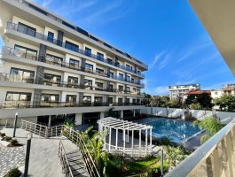 Новая квартира 2+1 с отдельной кухней в современном ЖК, в открытом для ВНЖ районе - Оба