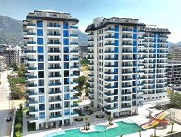 Новая меблированная квартира 2+1 в премиальном жилом комплексе. Район Махмутлар