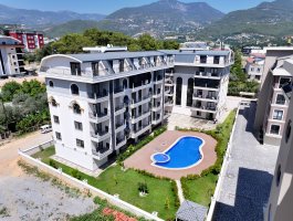 Новая квартира 1+1 в современном ЖК, в открытом для ВНЖ районе - Оба