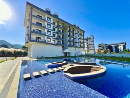 Новая меблированная квартира 1+1 всего в 350 м от моря. Район Каргыджак