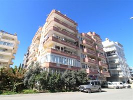 Недорогая квартира 2+1 с отдельной кухней, в 250 м от моря. Район Махмутлар