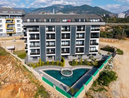 Дуплекс 3+1 с собственным садом в открытом для ВНЖ районе Оба