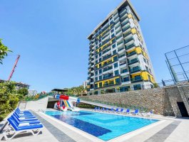 Квартира 2+1 с видом на море и горы в современном ЖК. Район Махмутлар