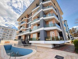 Новая квартира 1+1 в современном ЖК с инфраструктурой. Район Махмутлар