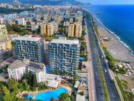 Квартира 2+1 в элитном ЖК на первой береговой линии. Район Махмутлар