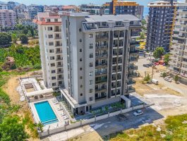 Новая трехкомнатная квартира в современном ЖК рядом с морем. Махмутлар