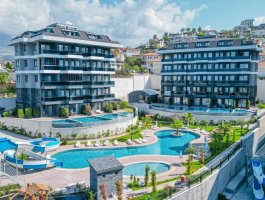 Квартира 1+1 с панорамным видом на море в современном ЖК. Район Каргыджак