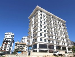 Новая квартира-дуплекс 2+1 в современном жилом комплексе в Махмутларе