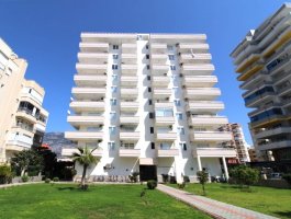 Квартира 2+1 с видом на море в 100 м от пляжа в районе Махмутлар