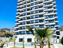 Меблированная квартира 1+1 в современном жилом комплексе в Махмутларе