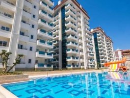 Квартира 1+1 с видом на море, в элитном жилом комплексе. Район Махмутлар