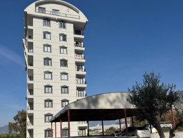 Новая квартира 1+1 с панорамным видом на горы в Махмутларе