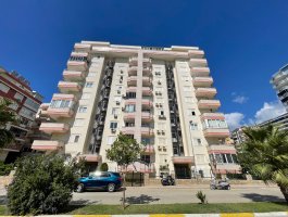 Дуплекс 3+1 с большой террасой и частной сауной, в 300 м от моря и пляжа. Район Махмутлар