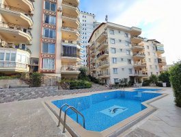 Квартира 2+1 под ВНЖ всего в 300 м от моря, в жилом комплексе с бассейном. Район Тосмур