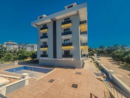 Новая квартира 1+1 в современном ЖК, в открытом для ВНЖ районе - Оба