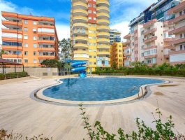 Квартира 2+1 в ЖК с бассейном в 500 м от моря. Район Махмутлар