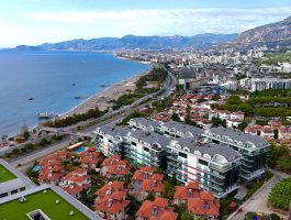 Дуплекс 3+1 с видом на море в элитном ЖК на первой береговой линии. Каргыджак