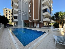 Квартира 3+1 всего в 200 м от моря и пляжа в Махмутларе