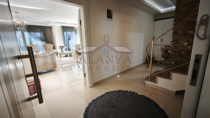 Дуплекс 3+1 с панорамным видом на море и меблировкой класса Люкс. Район Махмутлар